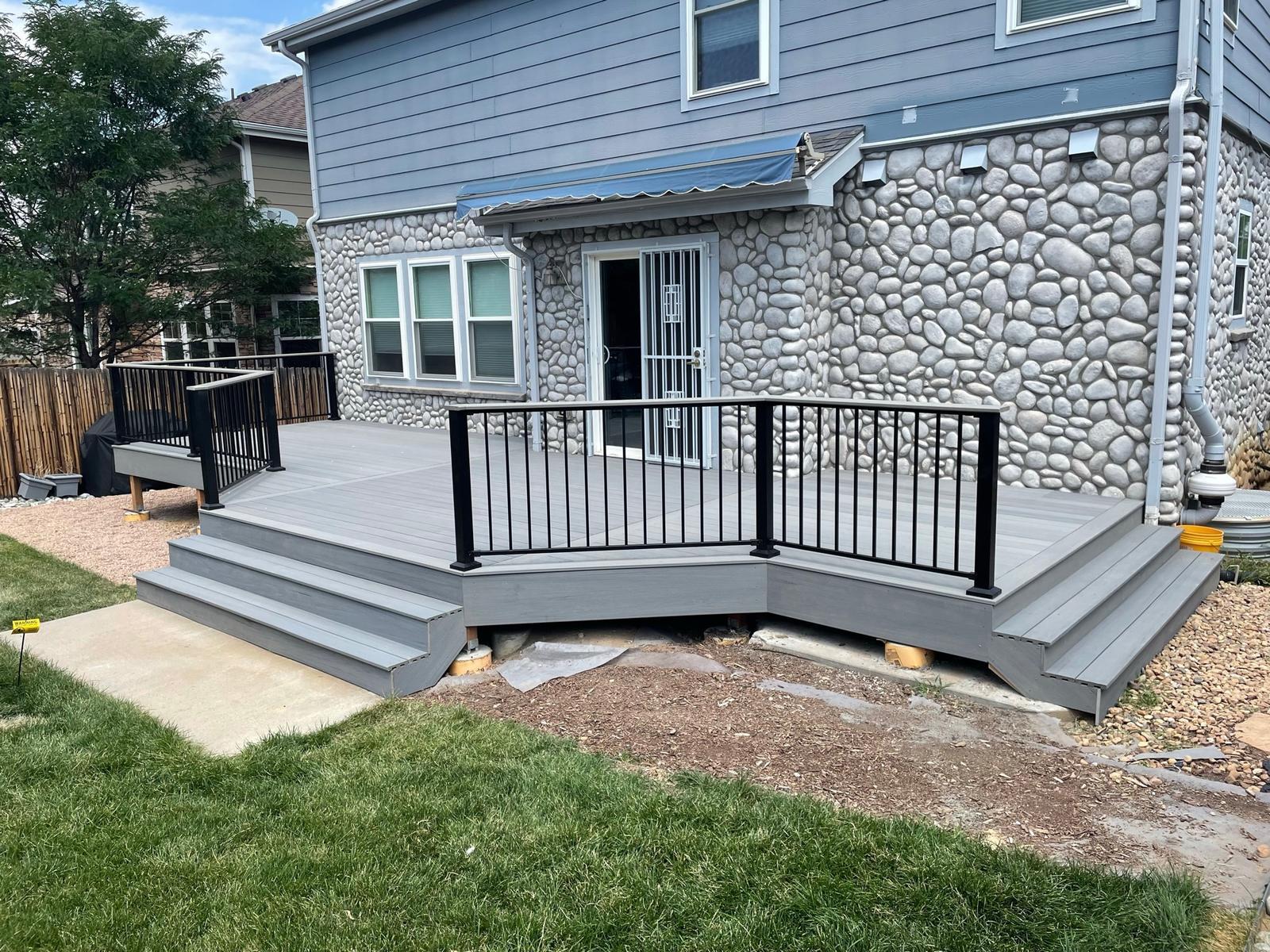 Composite Deck on a River-Rock Home